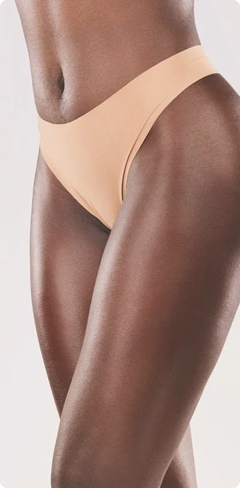 Patient results showing sculpted body contours after a liposuction procedure at ICLS Plastic Surgery