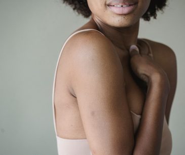 portrait of a woman showcasing natural skin texture and soft lighting.