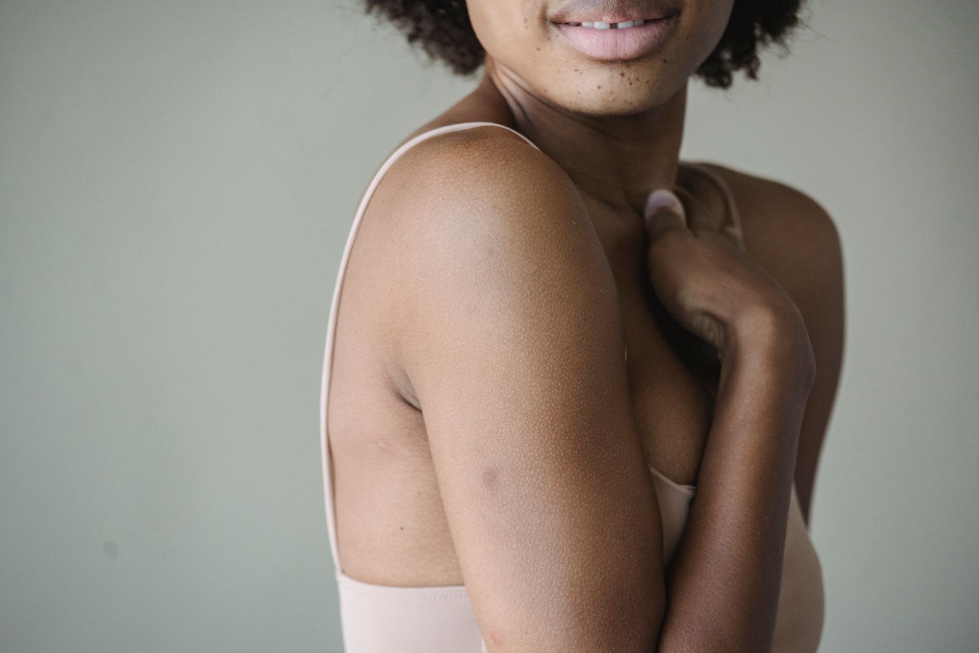 portrait of a woman showcasing natural skin texture and soft lighting.